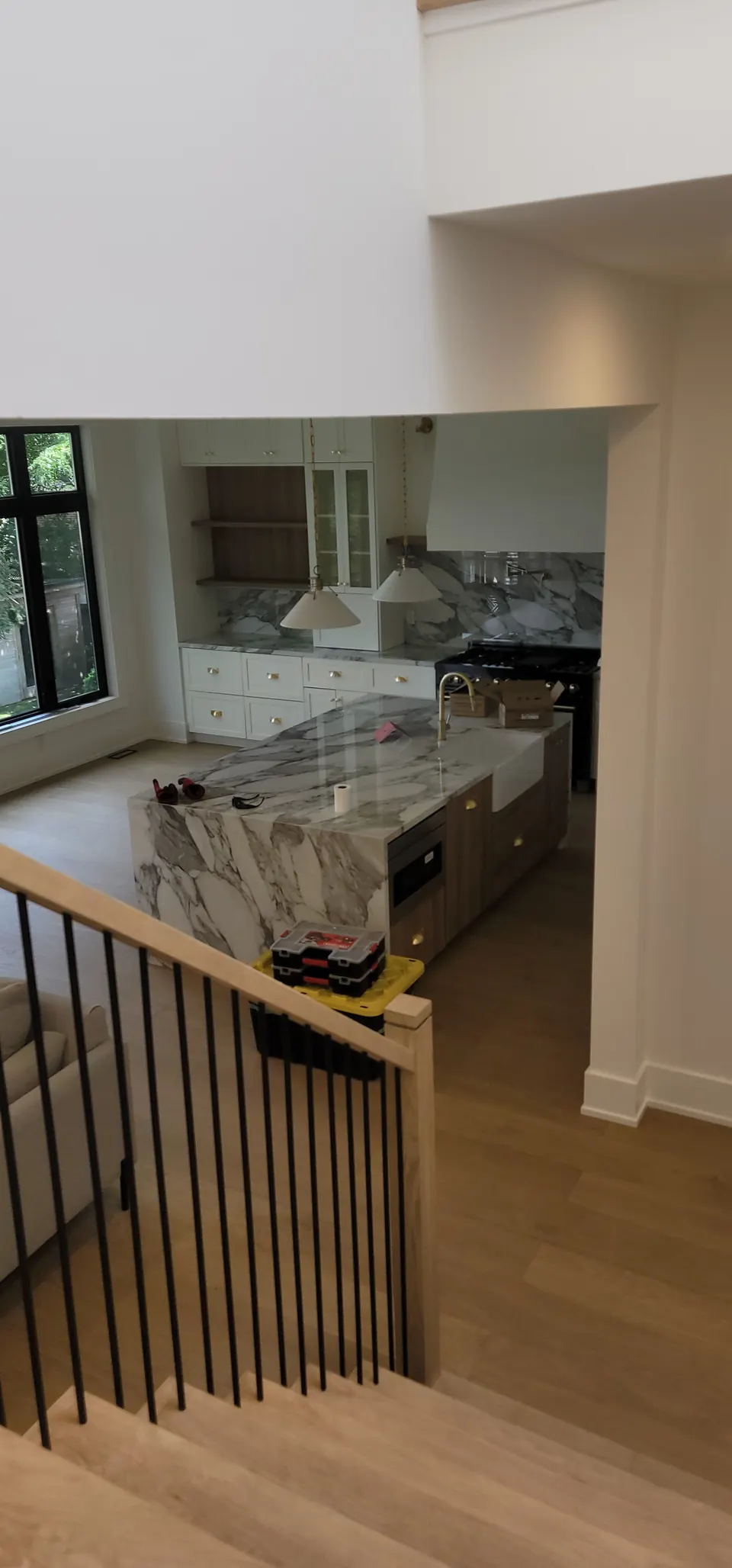 Renovated kitchen with a marble island