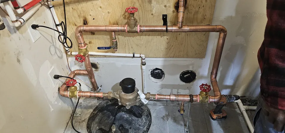 Water meter with copper headers and shut-off valves